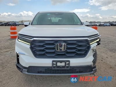 Piąte zdjęcie samochodu w środku: 2023 HONDA PILOT EXL VIN:5FNYG2H58PB009969 - miniatura