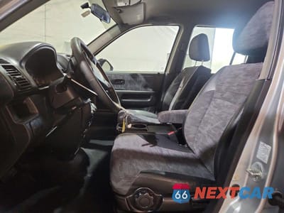 Zdjęcie 7 z 13 samochodu: 2003 HONDA CR-V LX VIN:SHSRD68453U102771 - miniatura