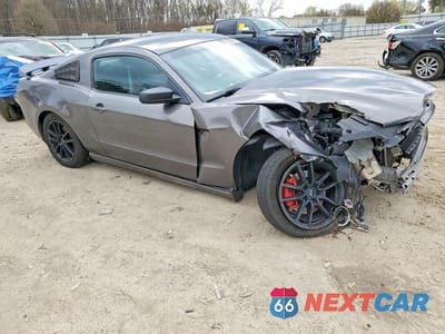 Czwarte zdjęcie samochodu z boku: 2014 FORD MUSTANG VIN:1ZVBP8AM9E5267911 - miniatura