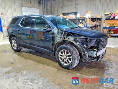 Czwarte zdjęcie samochodu z boku: 2019 CHEVROLET TRAVERSE LT VIN:1GNEVGKWXKJ222664 - miniatura