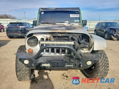 Piąte zdjęcie samochodu w środku: 2008 JEEP WRANGLER UNLIMITED SAHARA VIN:1J8GA591X8L543962 - miniatura