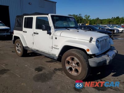 Czwarte zdjęcie samochodu z boku: 2017 JEEP WRANGLER UNLIMITED SAHARA VIN:1C4BJWEG6HL629948 - miniatura