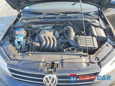 Zdjęcie 11 z 11 samochodu: 2015 VOLKSWAGEN JETTA BASE VIN:3VW2K7AJ9FM253839 - miniatura