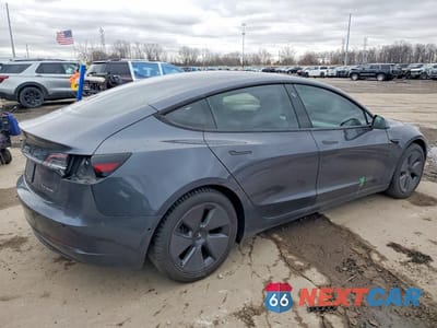 Trzecie zdjęcie samochodu z tyłu: 2021 TESLA MODEL 3 VIN:5YJ3E1EB4MF847898 - miniatura