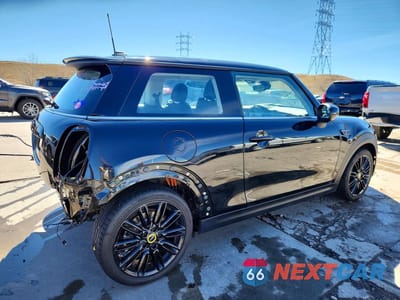 Trzecie zdjęcie samochodu z tyłu: 2024 MINI COOPER SE VIN:WMW13DJ01R2V43454 - miniatura