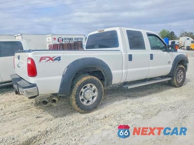 Trzecie zdjęcie samochodu z tyłu: 2014 FORD F250 SUPER DUTY VIN:1FT7W2BTXEEA31721 - miniatura