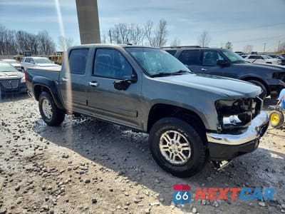 Czwarte zdjęcie samochodu z boku: 2011 GMC CANYON SLT VIN:1GTH6NFE6B8108354 - miniatura