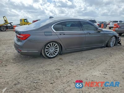 Trzecie zdjęcie samochodu z tyłu: 2017 BMW 740 I VIN:WBA7E2C5XHG740075 - miniatura