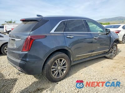 Trzecie zdjęcie samochodu z tyłu: 2021 CADILLAC XT5 PREMIUM LUXURY VIN:1GYKNDRS5MZ104324 - miniatura
