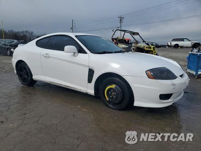 Czwarte zdjęcie samochodu z boku: 2005 HYUNDAI TIBURON GS VIN:KMHHM65DX5U174840 - miniatura