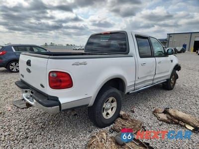 Trzecie zdjęcie samochodu z tyłu: 2002 FORD F150 SUPERCREW VIN:1FTRW08L12KD39197 - miniatura