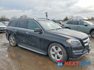 Czwarte zdjęcie samochodu z boku: 2014 MERCEDES-BENZ GL 450 4MATIC VIN:4JGDF7CE9EA312802 - miniatura