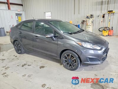 Czwarte zdjęcie samochodu z boku: 2016 FORD FIESTA SE VIN:3FADP4BJ1GM106450 - miniatura