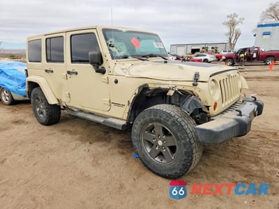 Czwarte zdjęcie samochodu z boku: 2011 JEEP WRANGLER UNLIMITED SPORT VIN:1J4BA3H10BL615826 - miniatura