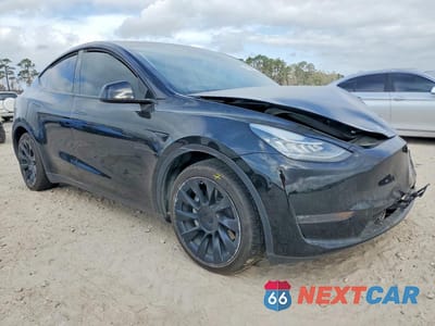 Czwarte zdjęcie samochodu z boku: 2023 TESLA MODEL Y VIN:7SAYGDEE5PA154709 - miniatura
