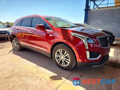 Czwarte zdjęcie samochodu z boku: 2021 CADILLAC XT5 PREMIUM LUXURY VIN:1GYKNCRS3MZ104395 - miniatura