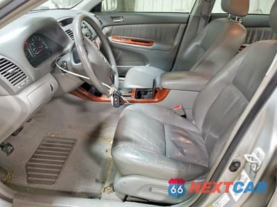 Zdjęcie 7 z 11 samochodu: 2002 TOYOTA CAMRY XLE V6 VIN:4T1BF30K42U505671 - miniatura