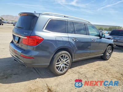 Trzecie zdjęcie samochodu z tyłu: 2015 MERCEDES-BENZ GL 450 4MATIC VIN:4JGDF6EE0FA575527 - miniatura
