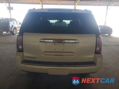 Zdjęcie 6 z 12 samochodu: 2015 GMC YUKON DENALI VIN:1GKS2CKJ8FR139425 - miniatura