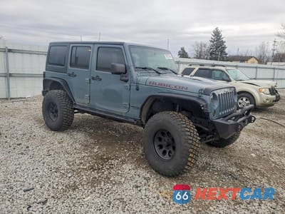 Czwarte zdjęcie samochodu z boku: 2014 JEEP WRANGLER UNLIMITED VIN:1C4HJWFG5EL263226 - miniatura