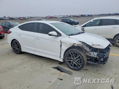 Czwarte zdjęcie samochodu z boku: 2019 HYUNDAI ELANTRA SPORT VIN:KMHD04LB9KU886994 - miniatura