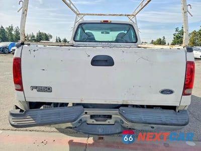 Zdjęcie 10 z 13 samochodu: 2003 FORD F250 SUPER DUTY VIN:3FTNF20L13MB32499 - miniatura