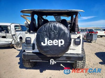 Zdjęcie 6 z 11 samochodu: 2001 JEEP WRANGLER / TJ SPORT VIN:1J4FA49S11P300748 - miniatura