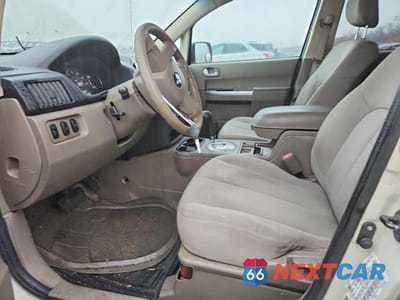 Zdjęcie 7 z 13 samochodu: 2007 MITSUBISHI ENDEAVOR LS VIN:4A4MN21S07E075298 - miniatura