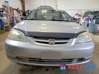 Piąte zdjęcie samochodu w środku: 2002 HONDA CIVIC LX VIN:1HGEM21592L808009 - miniatura