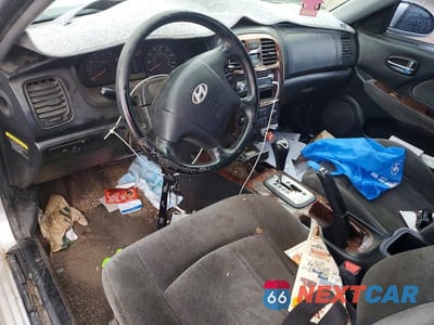 Zdjęcie 8 z 11 samochodu: 2004 HYUNDAI SONATA GLS VIN:KMHWF35H24A916232 - miniatura