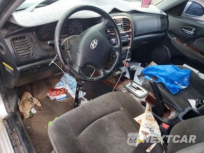 Zdjęcie 8 z 11 samochodu: 2004 HYUNDAI SONATA GLS VIN:KMHWF35H24A916232 - miniatura