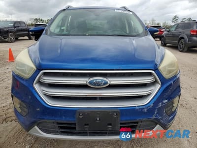 Piąte zdjęcie samochodu w środku: 2017 FORD ESCAPE TITANIUM VIN:1FMCU0JD3HUE94440 - miniatura