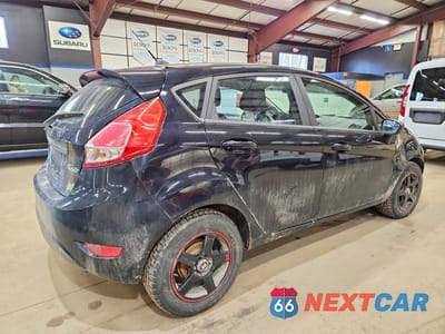 Trzecie zdjęcie samochodu z tyłu: 2016 FORD FIESTA S VIN:3FADP4TJ8GM169429 - miniatura