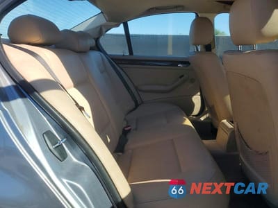 Zdjęcie 10 z 11 samochodu: 2004 BMW 325 IS SULEV VIN:WBAAZ33404KP90854 - miniatura