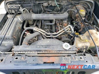 Zdjęcie 11 z 12 samochodu: 2003 JEEP WRANGLER COMMANDO VIN:1J4FA39S33P352590 - miniatura