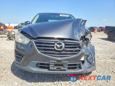 Piąte zdjęcie samochodu w środku: 2016 MAZDA CX-5 SPORT VIN:JM3KE2BY9G0631761 - miniatura