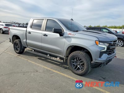 Czwarte zdjęcie samochodu z boku: 2023 CHEVROLET SILVERADO K1500 LT TRAIL BOSS VIN:3GCPDFEK4PG251450 - miniatura