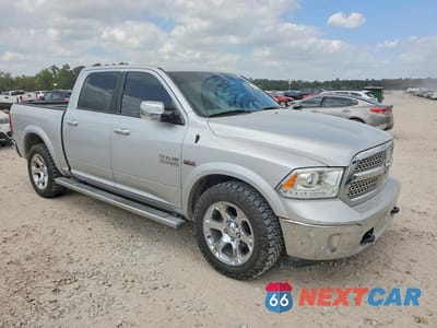 Czwarte zdjęcie samochodu z boku: 2014 RAM 1500 LARAMIE VIN:1C6RR7NT2ES440202 - miniatura