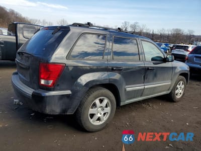 Trzecie zdjęcie samochodu z tyłu: 2010 JEEP GRAND CHEROKEE LAREDO VIN:1J4PR4GK0AC104159 - miniatura