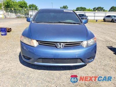 Piąte zdjęcie samochodu w środku: 2006 HONDA CIVIC LX VIN:2HGFG12646H530734 - miniatura