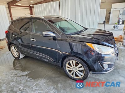 Czwarte zdjęcie samochodu z boku: 2012 HYUNDAI TUCSON LIMITED VIN:KM8JU3AC9CU512898 - miniatura