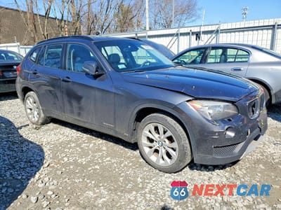 Czwarte zdjęcie samochodu z boku: 2014 BMW X1 XDRIVE28I VIN:WBAVL1C57EVY20268 - miniatura