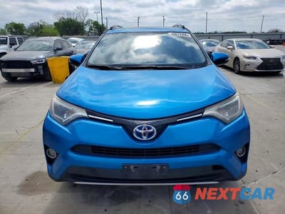 Piąte zdjęcie samochodu w środku: 2016 TOYOTA RAV4 HYBRID XLE VIN:JTMRJREV8GD058518 - miniatura