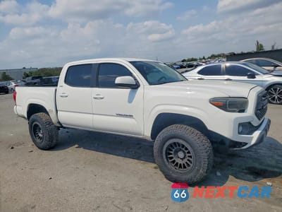 Czwarte zdjęcie samochodu z boku: 2016 TOYOTA TACOMA SR5 V6 VIN:3TMAZ5CNXGM002005 - miniatura