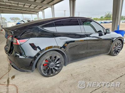 Trzecie zdjęcie samochodu z tyłu: 2022 TESL MODEL Y PERFORMANCE VIN:7SAYGDEF0NF576394 - miniatura