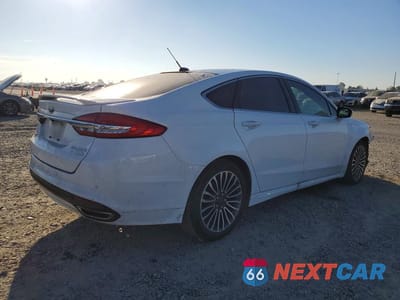 Trzecie zdjęcie samochodu z tyłu: 2017 FORD FUSION TITANIUM VIN:3FA6P0K90HR111120 - miniatura