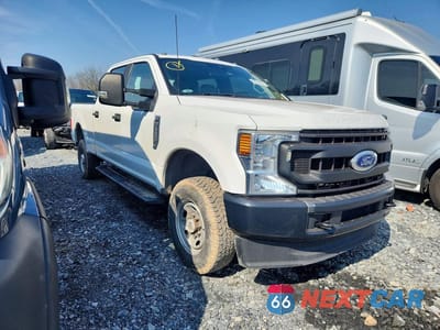 Czwarte zdjęcie samochodu z boku: 2022 FORD F350 SUPER DUTY VIN:1FT8W3B65NEE20237 - miniatura