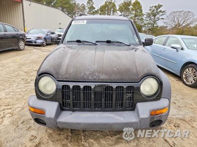 Piąte zdjęcie samochodu w środku: 2003 JEEP LIBERTY SPORT VIN:1J4GL48K13W688962 - miniatura