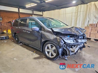 Czwarte zdjęcie samochodu z boku: 2018 HONDA ODYSSEY EX VIN:5FNRL6H5XJB075888 - miniatura