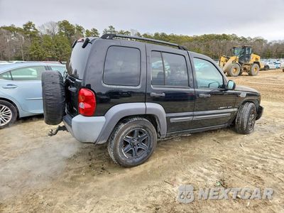 Trzecie zdjęcie samochodu z tyłu: 2003 JEEP LIBERTY SPORT VIN:1J4GL48K13W688962 - miniatura